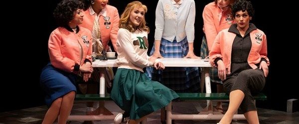 Pink Ladies at a table in Grease