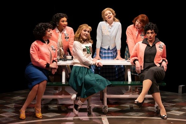 Pink Ladies at a table in Grease