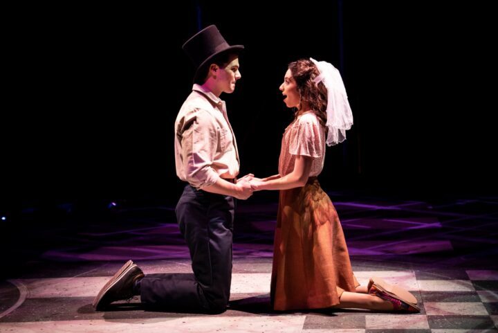 Tony and Maria kneeling on the floor in the Marriott Lincolnshire production of West Side Story