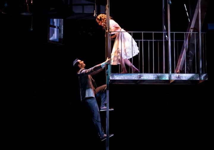 Maria on the balcony and Tony climbing down the ladder in West Side Story