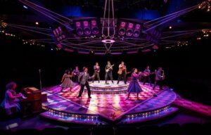 The Cast of Buddy Holly Marriott Lincolnshire on stage playing instruments