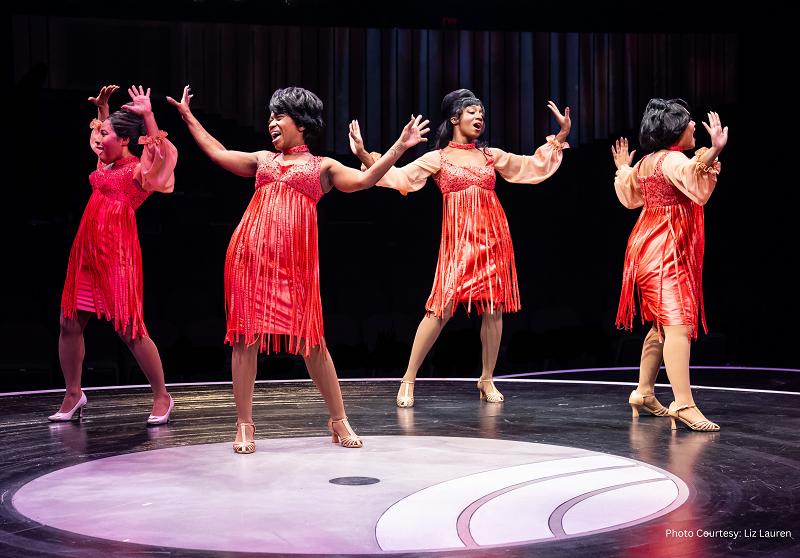 Beautiful Alexis J Roston and Ensemble dancing on a record at Marriott Theatre