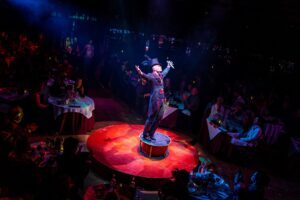 Cunio on stage in Teatro ZinZanni 'Love, Chaos, and Dinner" in Chicago