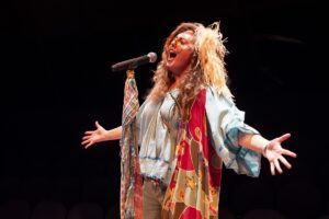 Grace Bobber as Janis Joplin in 'Beehive: The 60's Musical' at Marriott Theatre