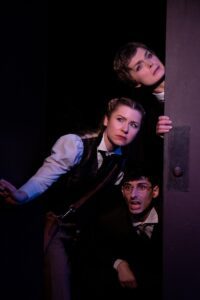 Top-Bottom: Cris King, Laura Michele Erle, and Jacob Gage in 'Dracula: A Comedy Of Terrors' at Lazy Susan Theatre Co.