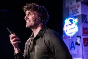 Mike Newquist in 'Fully Committed' in Chicago - Photo Credit: Derek Bertelsen