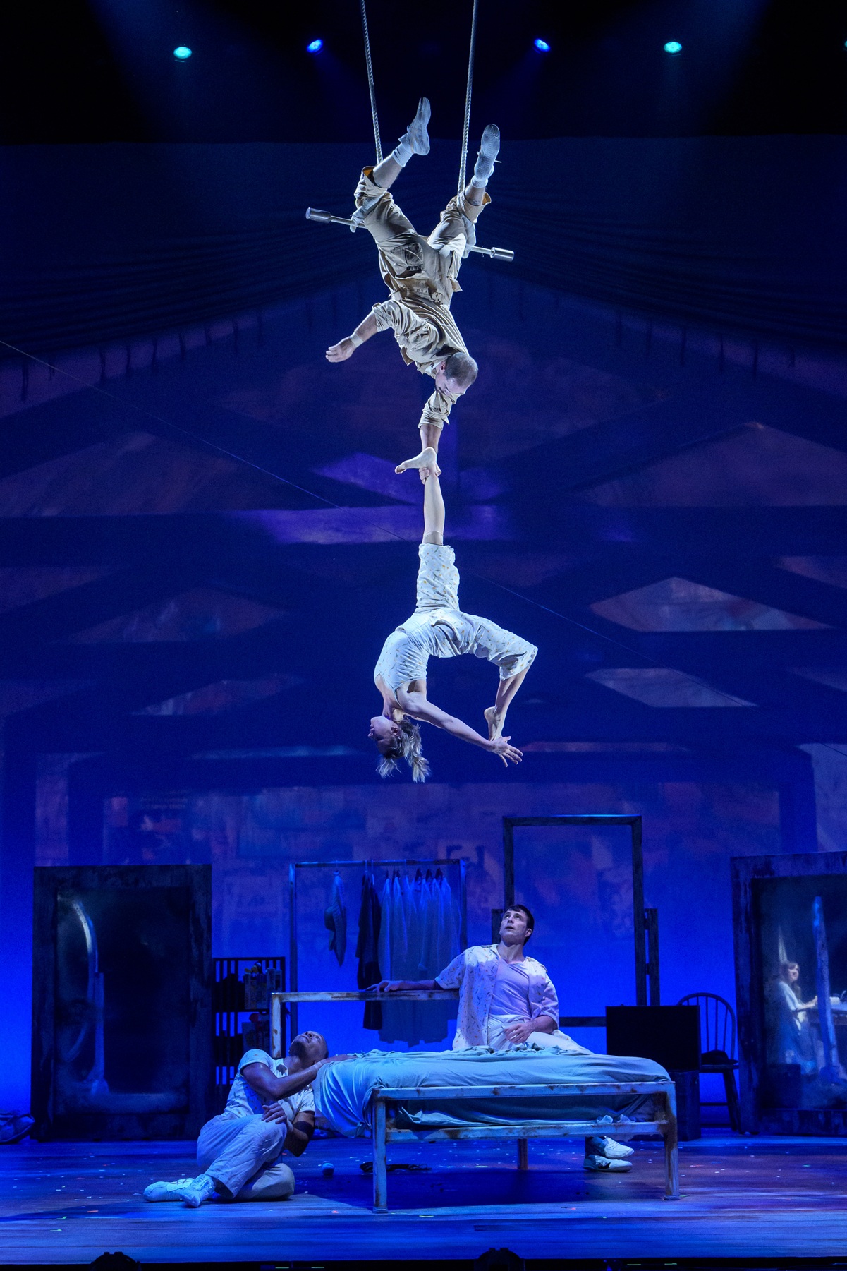 An extraordinary fusion of storytelling, dance, aerial artistry, music, and visual spectacle, The Attic: Things I've Seen While Lying On My Back turns one woman's life into a theatrical experience so full of movement and invention that you won't want to look away. Eduardo De Azevedo Grillo, Anna Kichtchenko, Fran Alvarez, and Melvin Diggs in 'The Attic' at Goodman Theatre in Chicago